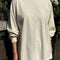 model wearing naturel cotton long sleeve tunic with mockneck