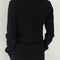 back view of model wearing black waffle long sleeve tee
