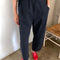 model wearing washed black cotton pants