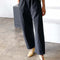 model wearing washed black cotton pants