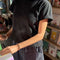 model wearing black relaxed fit tee with a slight crop