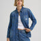 model wearing blue relaxed fit chore jacket with faint pinstripes, white bleach splatters and patch pockets