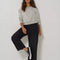 model wearing black loose crop button fly jeans