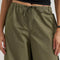 model wearing green low rise parachute cargo pants with ruched bottoms