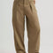 model wearing tan brown slouch chino pants with pleated front