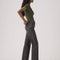 side view of model wearing black wash relaxed straight leg jeans