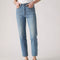 bottom view of model wearing light denim wedgie straight jeans