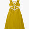 chartreuse midi dress with white lace accents on the bust, two tie front and ruffle detail on the shoulders