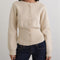model wearing ivory cardigan with cinched in waist