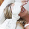 model wearing bone weighted eye mask over their eyes