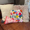 pink pennant flag throw pillow with 'heck yeah!' across the front