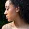 model wearing silver starfish stud earrings