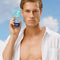 model holding crystal spf 50 invisible face gel