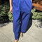 model wearing royal blue carpenter cotton pants