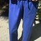 up close of model wearing royal blue carpenter cotton pants