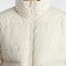 up close of model wearing cream cropped puffer jacket