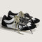 black and metallic silver super low pro sneakers with black and white speckled laces and sage laces