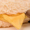 up close of cheese on smiley grilled cheese warmies heating plush