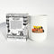 front and back view of coconut, suntan oil, and cannabis scented candle and packaging