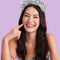 model wearing silver tinsel, disco ball and star headband