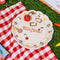 white trinket tray with abstract print with 'you're the cherry top!' and 3D cherry ring holder on red checkered blanket