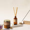 ojai lavender standard soy candle next to reed diffuser