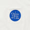 close up image of patch pocket featuring a blue circle design and the words i choose a state of calm