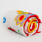 rolled white quilted blanket with colorful icons and 'i'd rather be home reading' text in the center