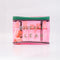 pink and green plastic 'squeaky clean' travel kit with two pots, a funnel, mini spatula, one pump, one spray bottle and label sheet