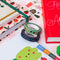 set of 5 colorful washi tape with various prints and typography on a table