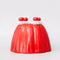 up close of red jello mold vase/planter
