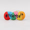 colorful beaded ornament with beaded 'bookworm' across the front with old thread for hanging