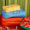 4 packing cubes with various sayings and realistic prints