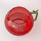 top view of textured apple shaped pitcher with green handle