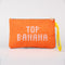 Reverse side of small rattan pouch with fruit tile design and zipper top with TOP BANANA' across the front