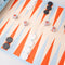 up close of backgammon game with pieces and dice