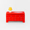 red dress trinket box with yellow lamp and cat doily