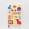 cream embroidered journal wth various folk items - homes, butterflies, stamps, dog, cat, books