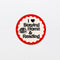 cream sticker with red scalloped trim that says 'i <3 staying home & reading'