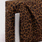 brown leopard cloud carry-on with a laptop sticking out