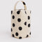 cream dopp kit with black polka dots