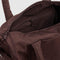 interior of brown duffle bag