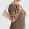 model carrying custard pochette 