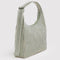 side view of sage stripe and white vertical stripe shoulder bag