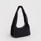 side view of black small meringue bag with silver studs