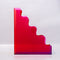 red side of red, pink, yellow and blue acrylic wavy file folder holder