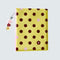 front of mini photo album with yellow with black polka dots and maroon with pink dots