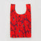 red pleated baggu bag with purple snapdragon print