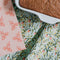 up close of sea foam strawberry tea towel