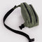 unbuckled muted olive green fanny pack with black strap